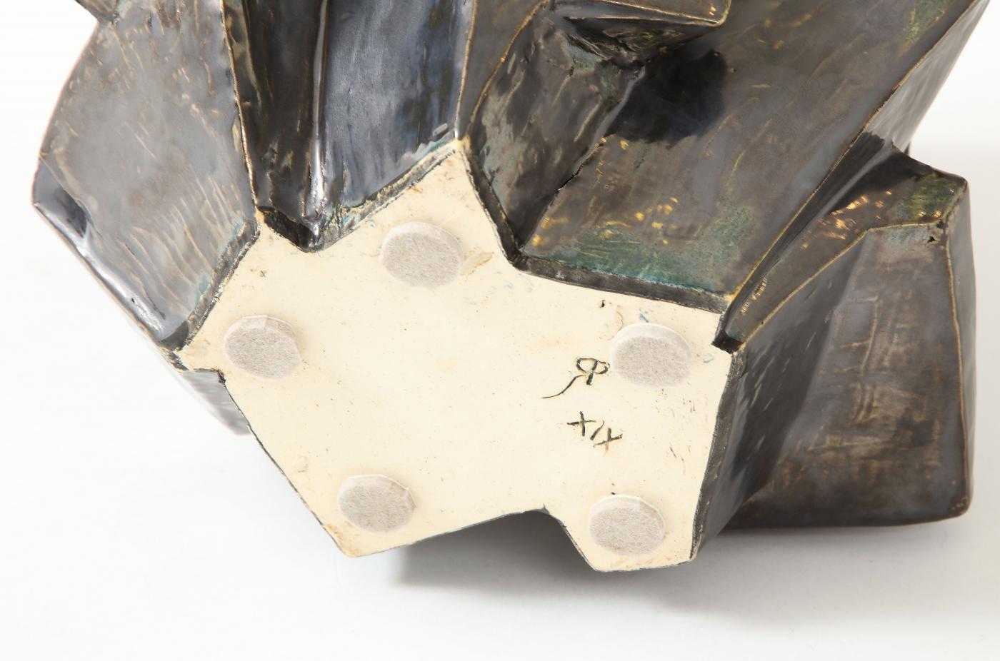 An R.A Pesce wheel-thrown cubist vessel in white stoneware