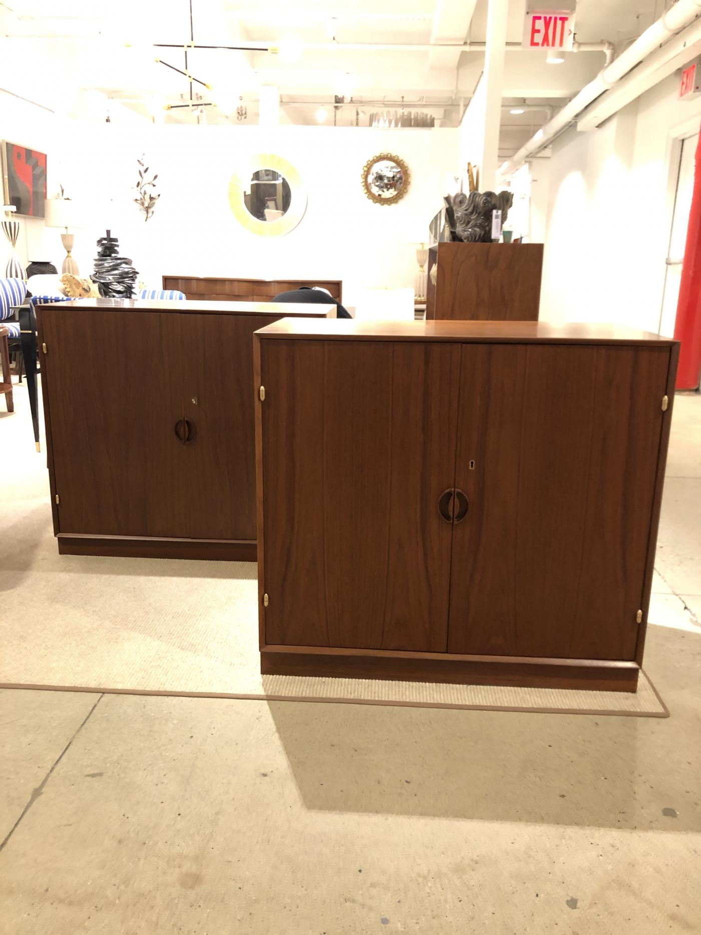 Pair of Mid Century Cabinets by John Stuart Inc. Stamped .