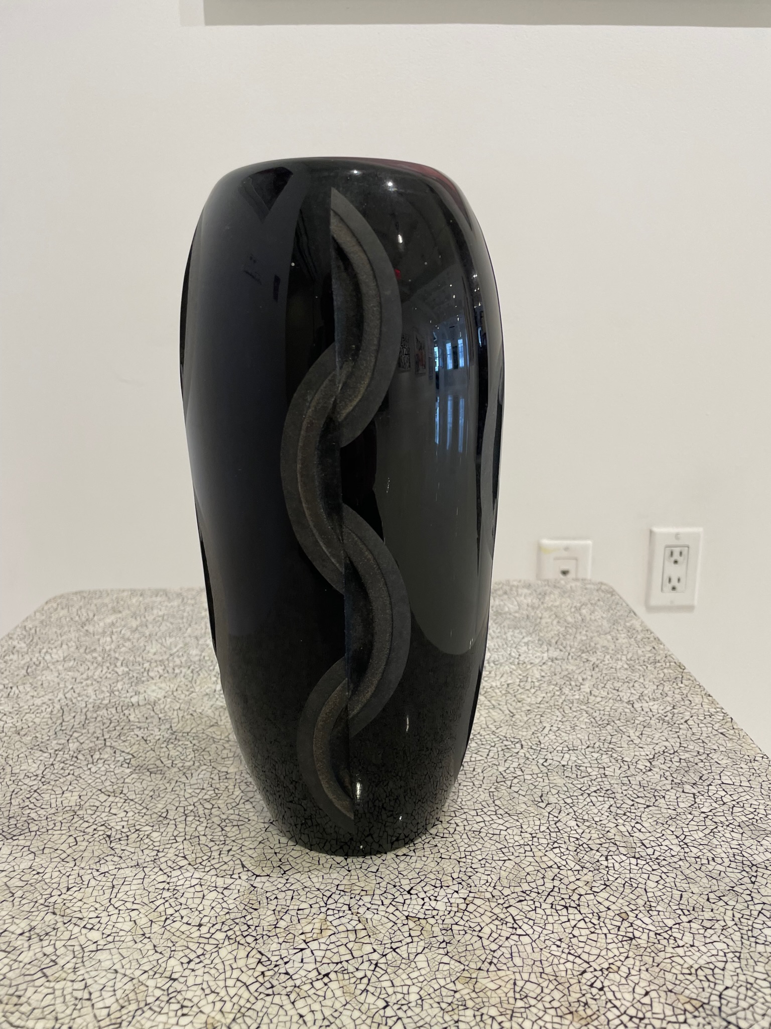 Tall geometric black acid etched vase by Jean Luce.