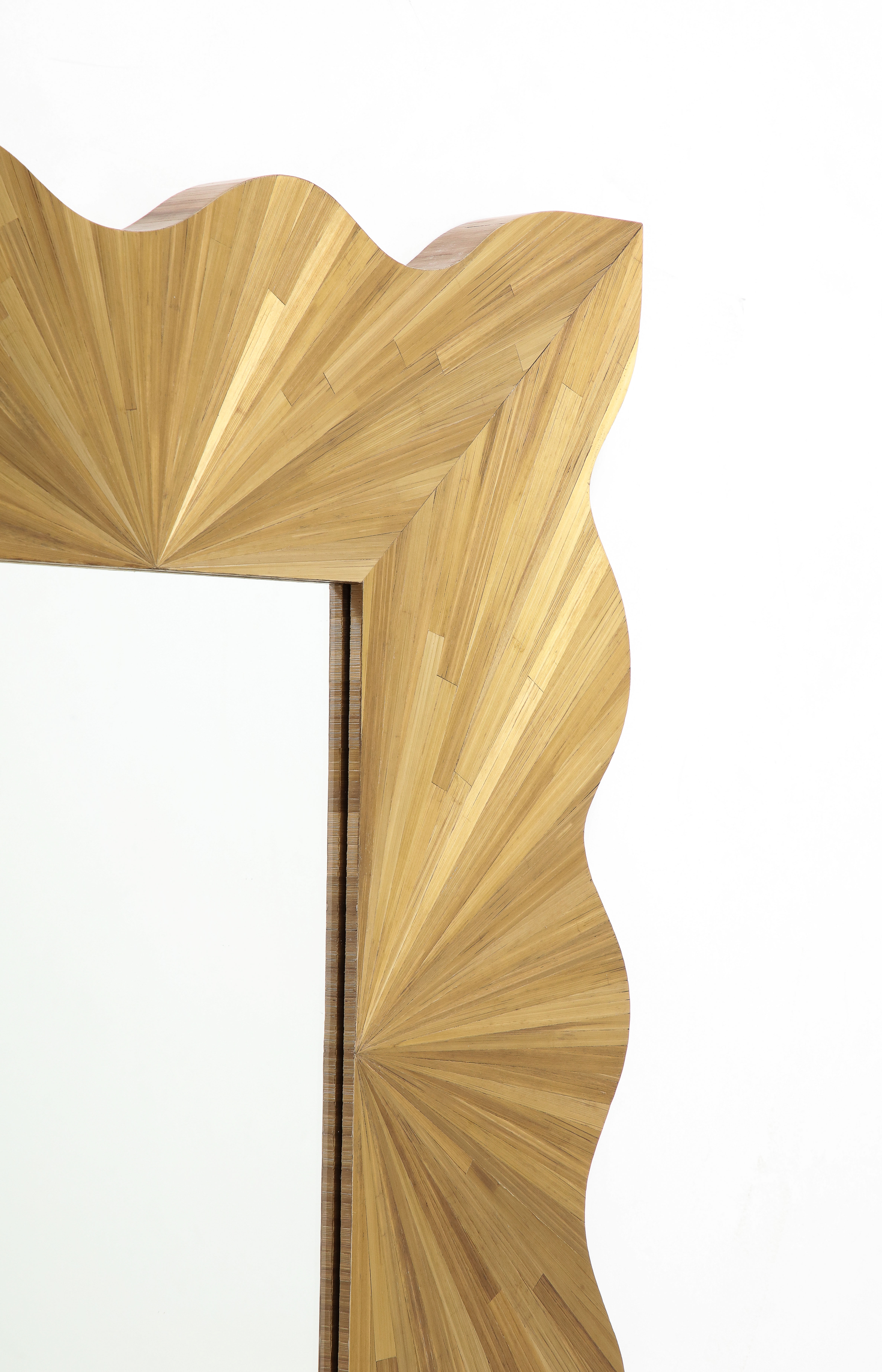 A Modernist rectangular mirror of contemporary straw marquetry