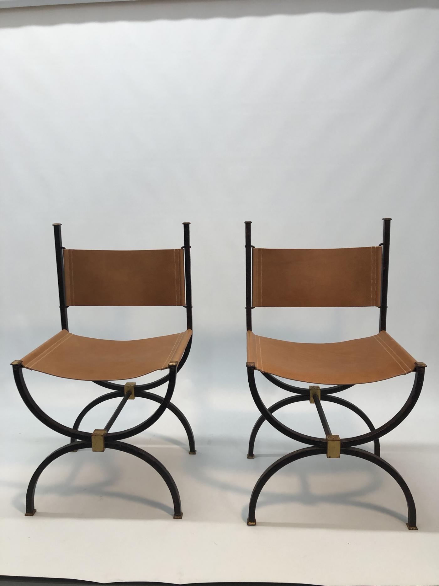 Pair of French Iron side chairs.