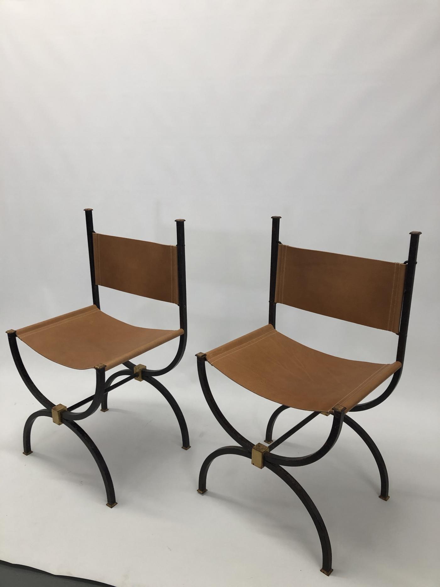 Pair of French Iron side chairs.