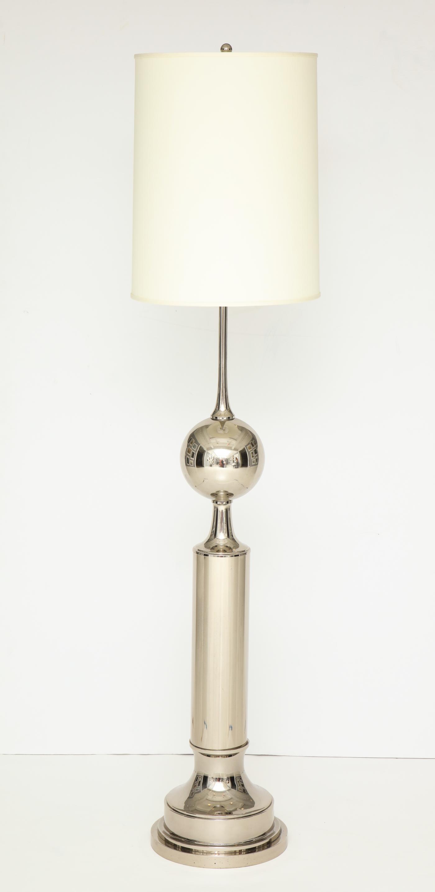 A French 40’s Floor Lamp. Crafted on nickel metal.