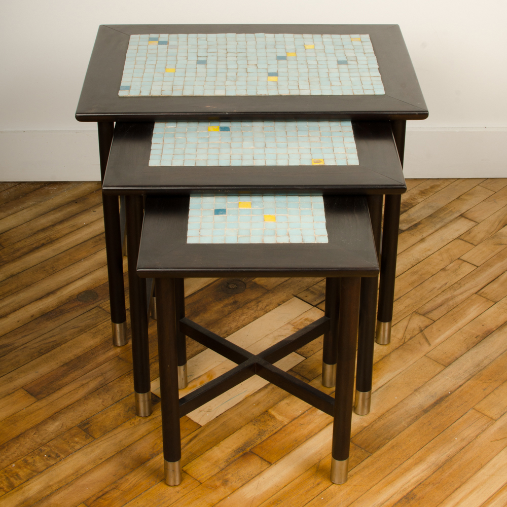 A set of three Mid-Century Modern nesting tables with tile inserts