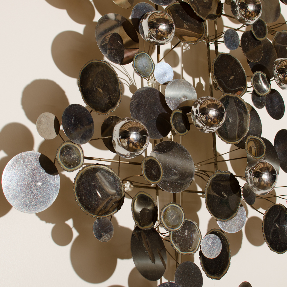 A raindrops sculpture designed by Curtis Jere for Artisan House. 