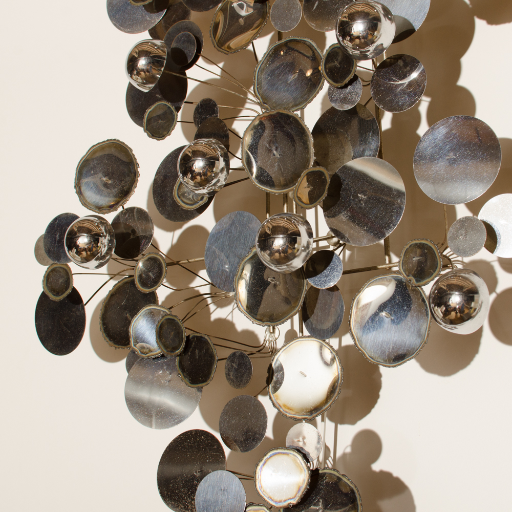 A raindrops sculpture designed by Curtis Jere for Artisan House. 
