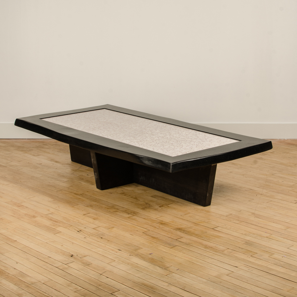 Modernist rectangular coffee table with eggshell fragment top.