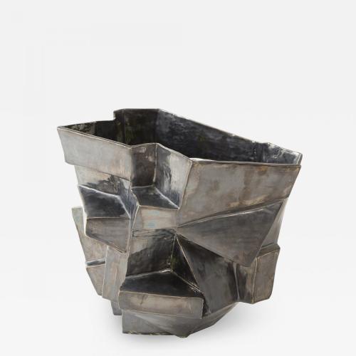 An R.A Pesce wheel-thrown cubist vessel in white stoneware