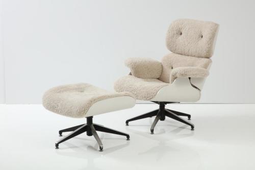 A Contemporary oversized and unique Lounge Chair with matching Ottoman