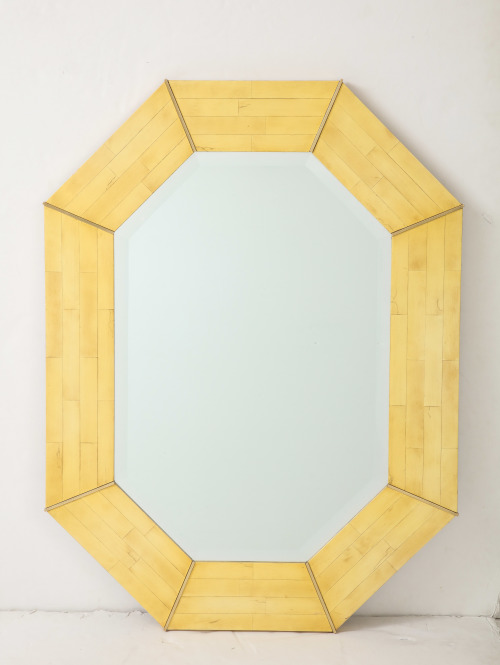 Octagonal mirror with tessellated Stone mosaic decoration and Brass details.