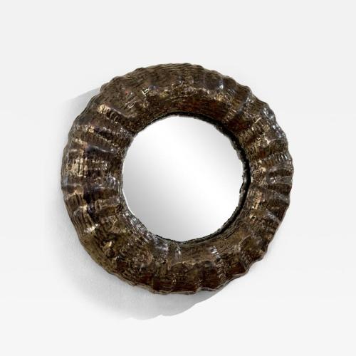 Textured raft-shaped mirror, black-chrome metallic glaze. Made By Aram C.