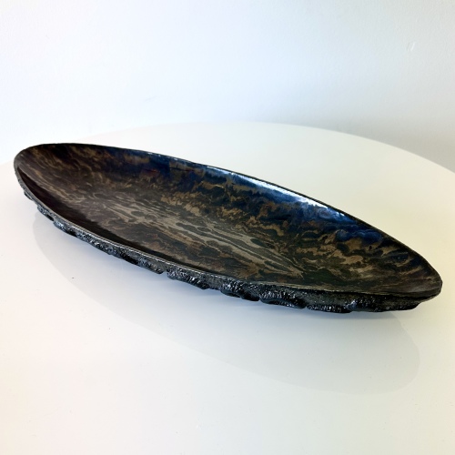 Oblong centerpiece  with ring-patterned underside in gold and silver glaze