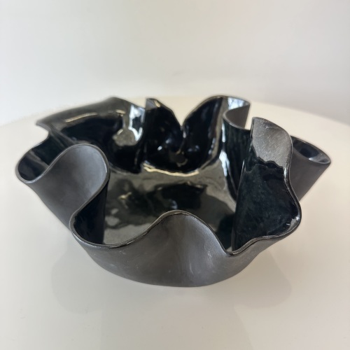 Organic ruffled-edge bowl in deep blue-black gloss finish.