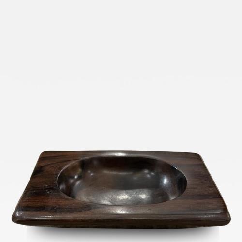 Walnut vide poche hand carved by Odile Noll.