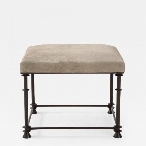 An elegant bronze stool covered with "nubuck retourné".