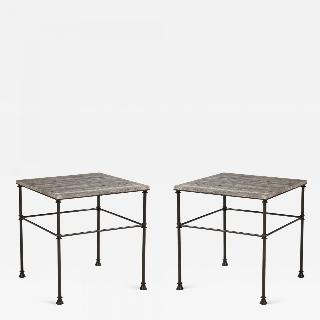 A pair of custom made tables, bronze legs and "Bleu Océan "color travertine top.