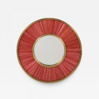 Modernist mirror. Executed in straw marquetry and solid brass frame.